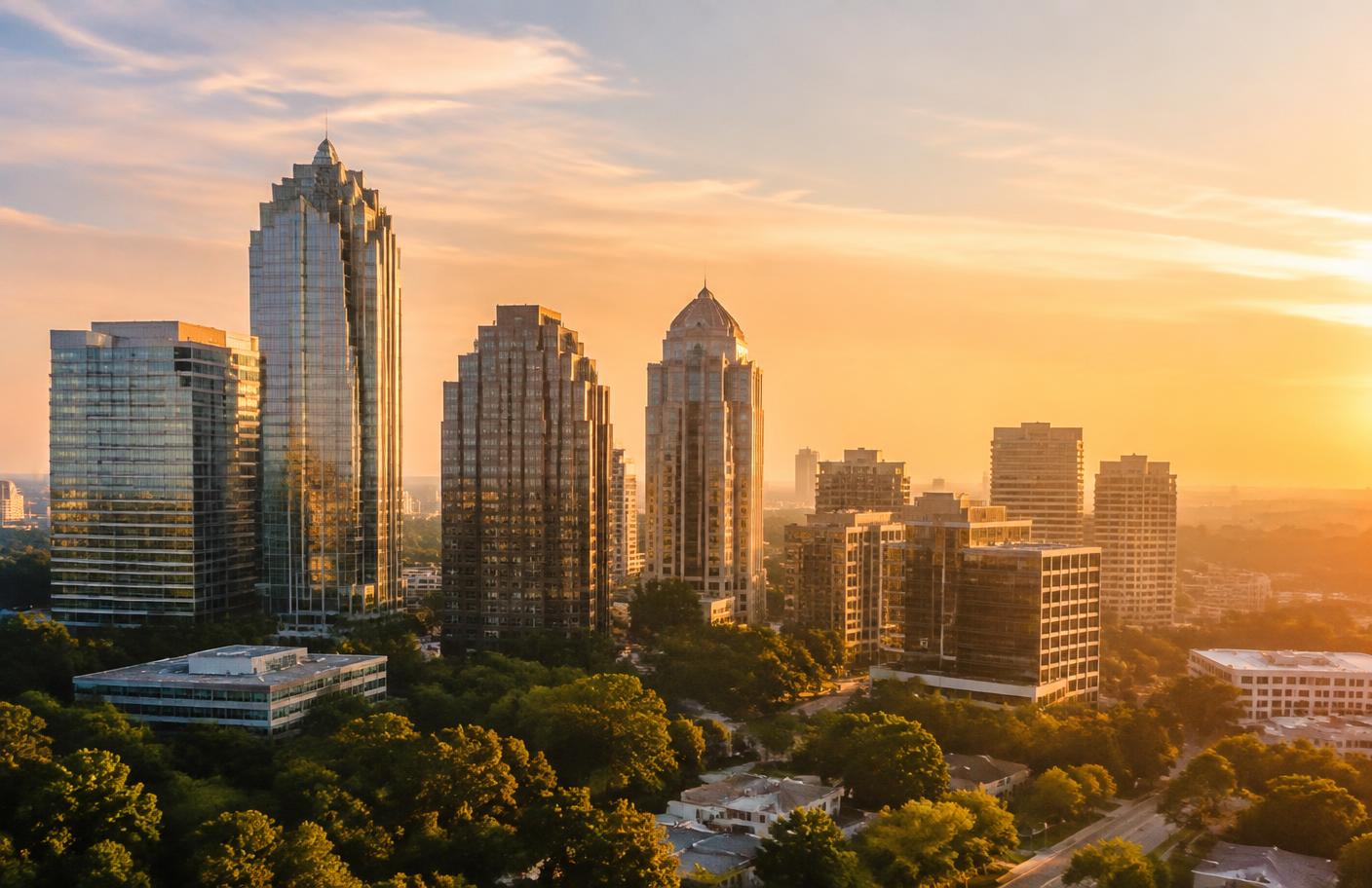 Buckhead Atlanta skyline of office towers surrounded by trees at golden hour